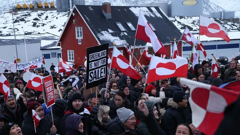 Greenlanders rally in Nuuk earlier this year with signs rejecting Trump's takeover bid